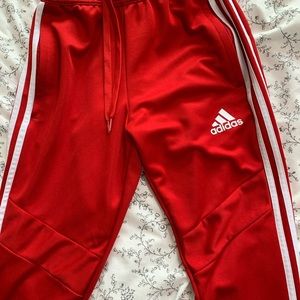 Red track pants